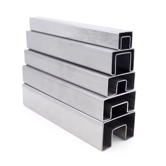 Stack of stainless steel slotted square handrail tubes in varying sizes on a white background.